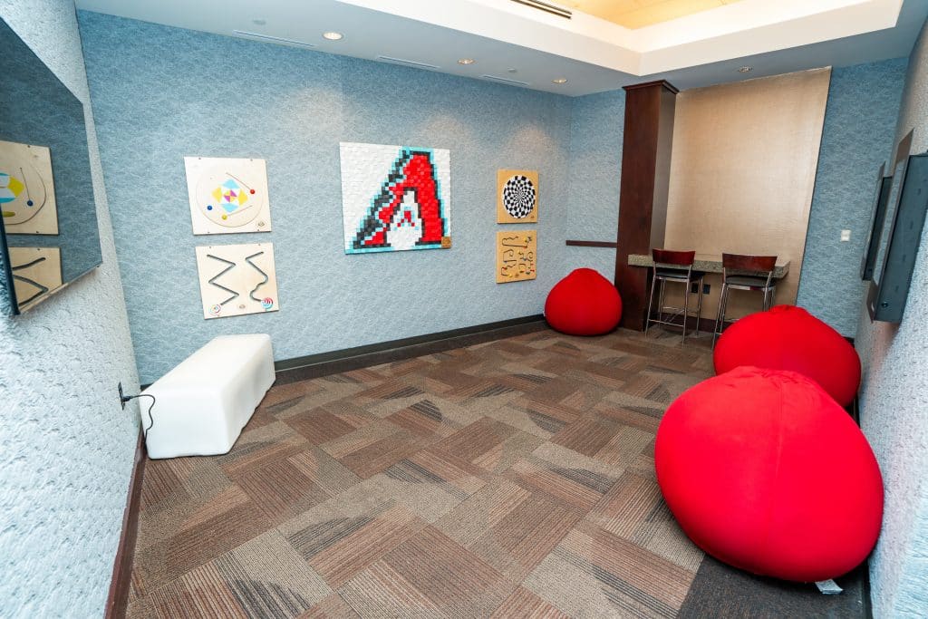 Sensory room at Chase Field designed by Roman Empire Agency with calming colors and sensory tools