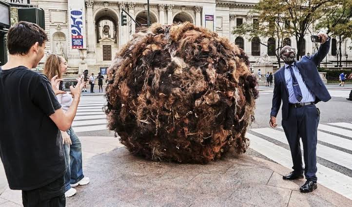 K18 Tumblehair giant hairball PR stunt rolling through New York City